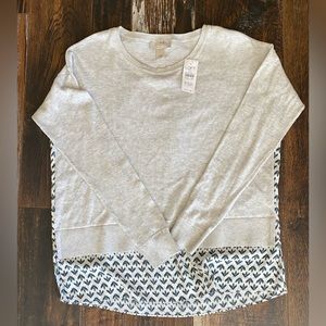 Light grey front, blue, green, black flowered back sweater size XSP